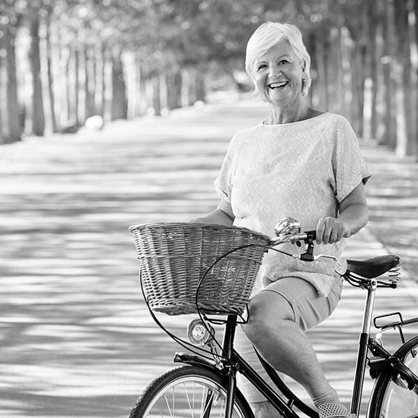 Photo of a senior woman on a bicycle